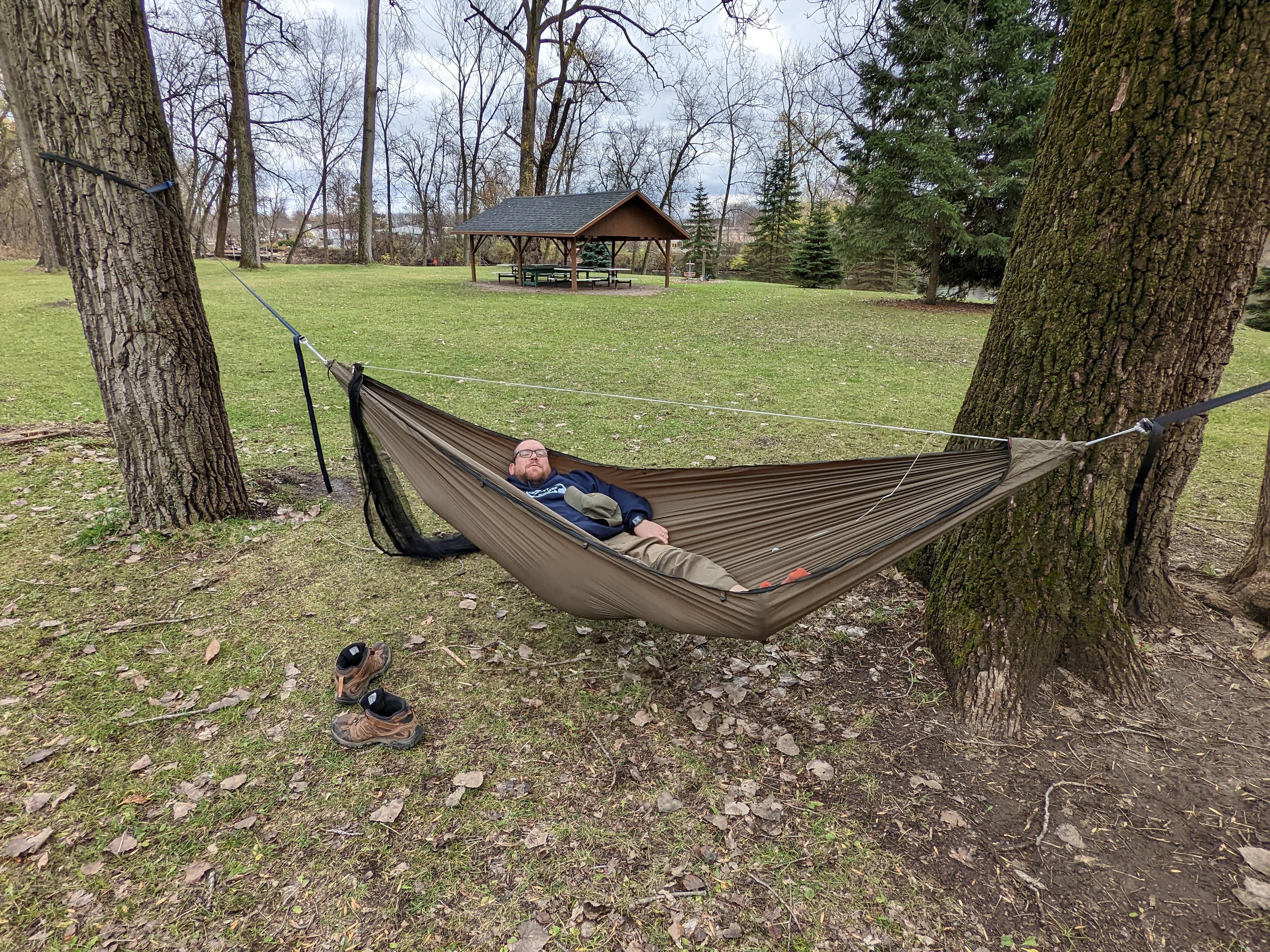 the author in their hammock, sans underquilt or tarp